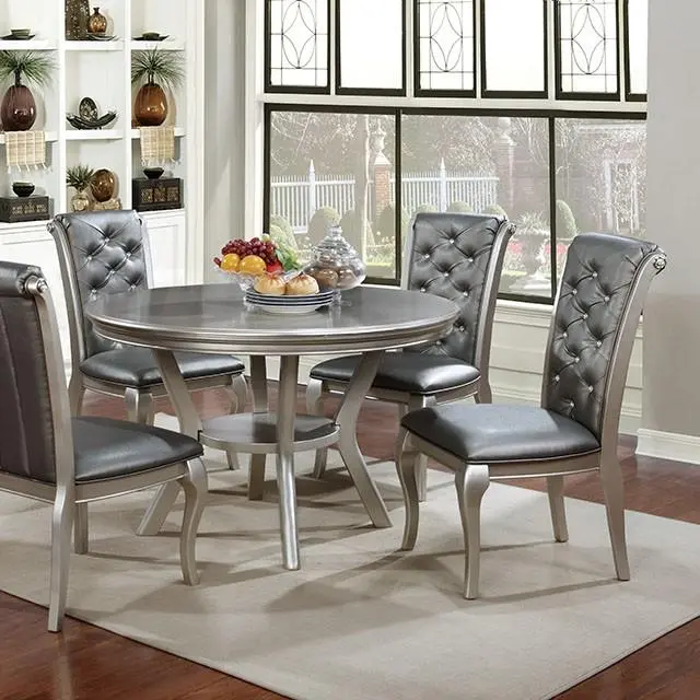 Amina Champagne Round Dining Table With Sleek Metallic Accents 1